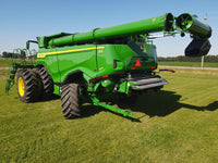 LANTH21387 -- Folding and telescoping hitch for John Deere® X9 Series combines